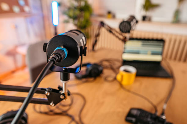 istock Studio Microphones set up for podcast recording 1358952363