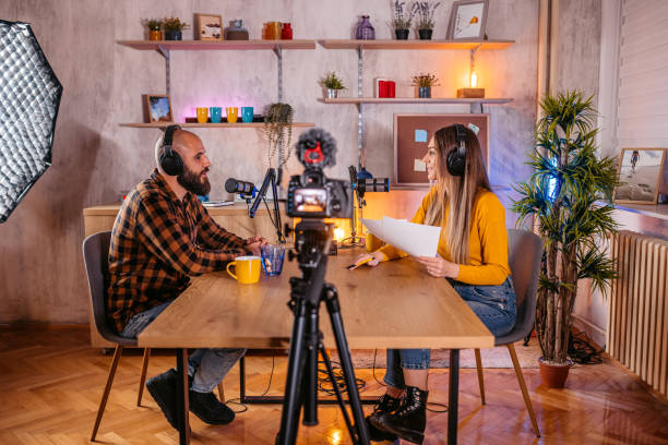 istock Podcast host and guest recording interview 1358953457