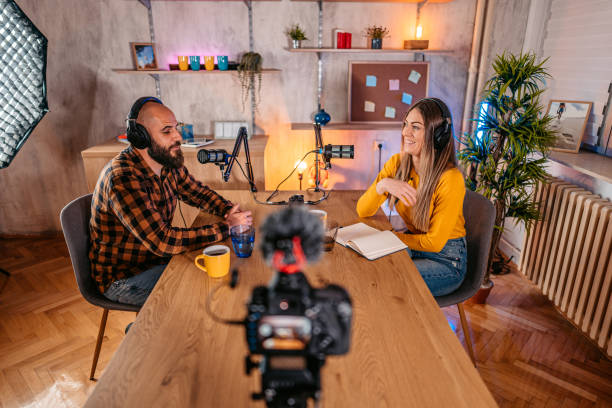 istock Podcast host and guest recording interview 1358953546
