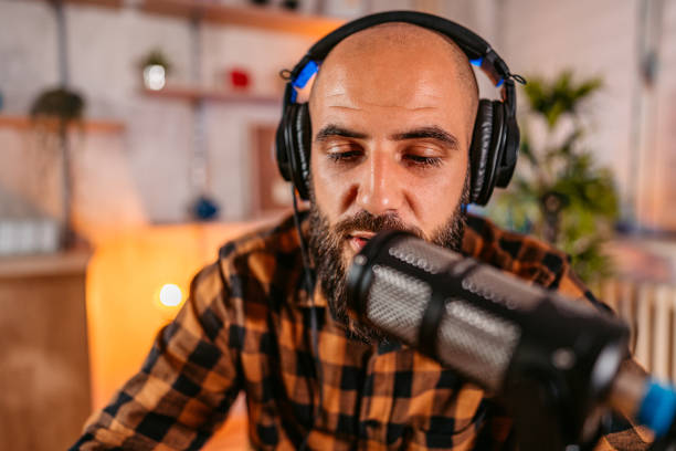 istock Man working on recording a podcast 1358954399