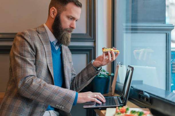 istock Businessman working in cafe 1358956178