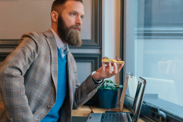 istock Businessman working in cafe 1358956234