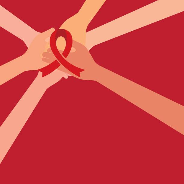 istock Hand with ribbon Breast cancer awareness 1358957460