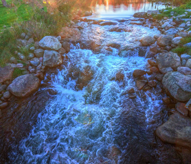 istock Waterfall on the AuSable River in fall-Grayling Michigan 1358959374