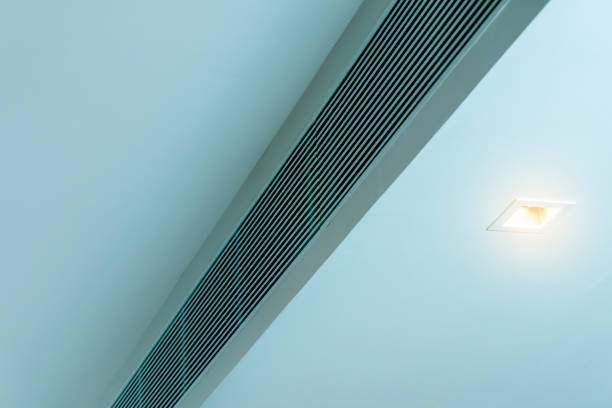 istock Ceiling concealed air duct and LED lighting in the Modern living room 1358960113