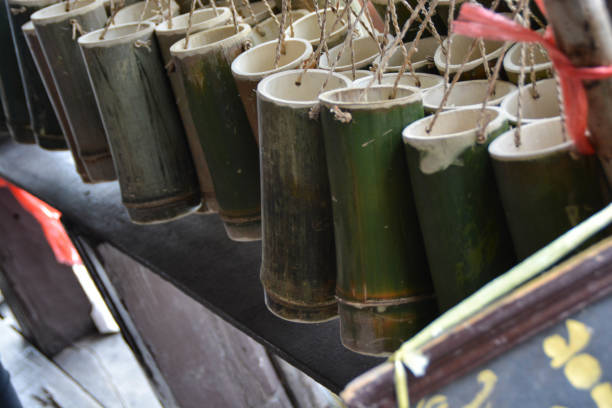 istock All bamboo tubes are hanging on something. 1358962388