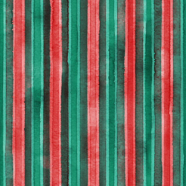 istock Watercolor red and green stripes background. Colorful striped seamless pattern 1358963229
