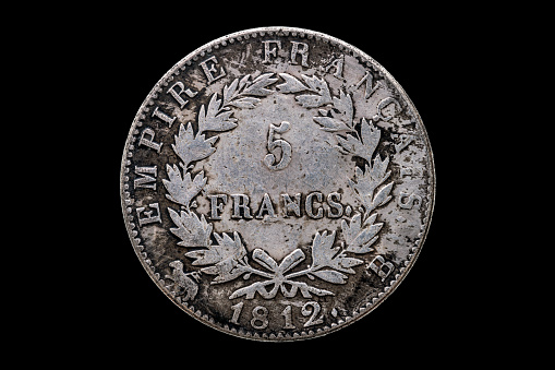 France Carolus IIII 5 francs silver coin replica dated 1804 showing the reverse with an empire celebration date of 1812 cut out and isolated on a black background, stock photo image