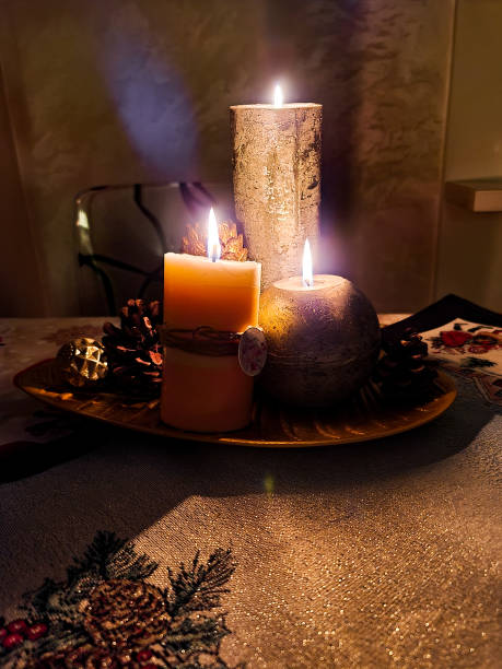 istock Festively lit candles on the Christmas table. Christmas mood. 1358963780