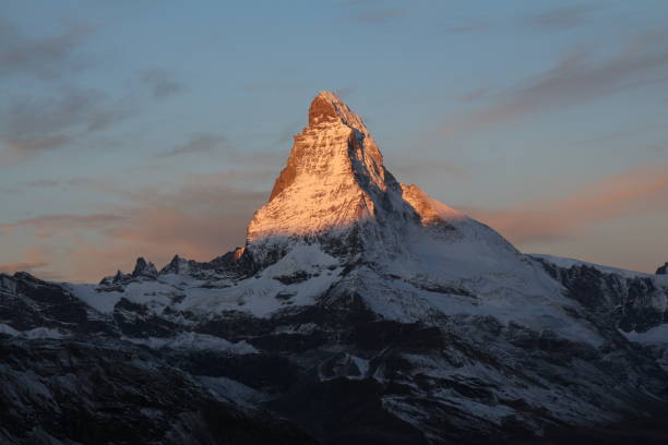 istock Bright lit peak of Mount Matterhorn. 1358963904