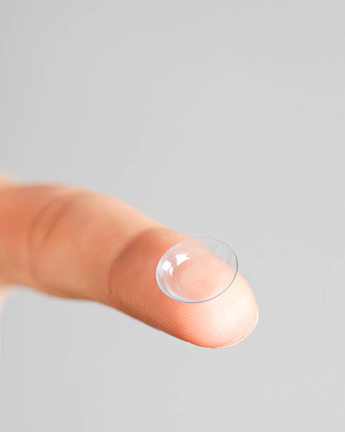 istock contact lens on finger 135896446