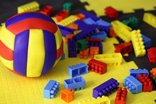 Plastic blocks and ball, close-up.