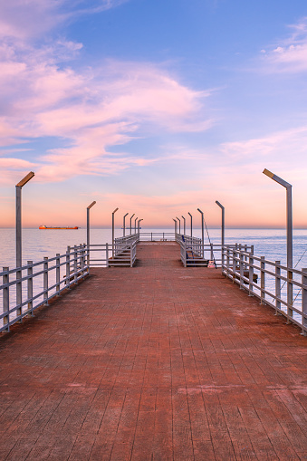 Batumi at the sunrise, with a ship approaching the port