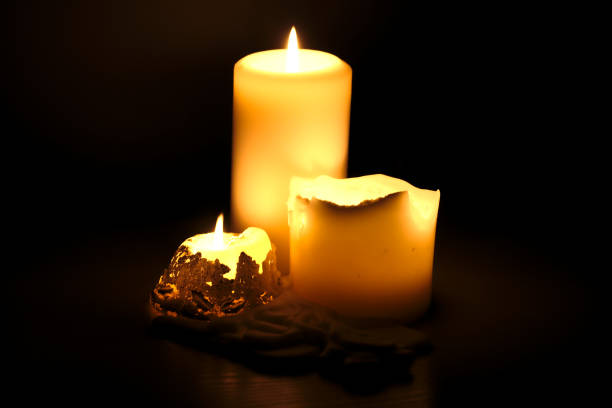 istock Burning candles in the dark. 1358967955