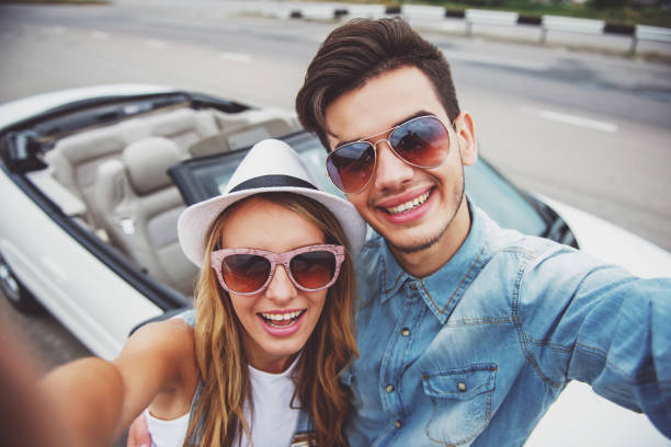 istock Friends in cabriolet 1358972290