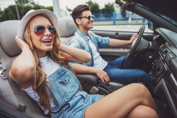 istock Friends in cabriolet 1358973206