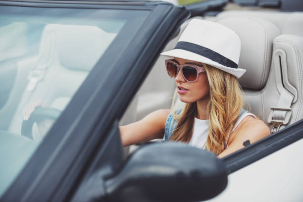 istock Friends in cabriolet 1358973806