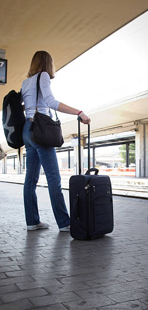 istock Railway station passenger with luggage 135897487