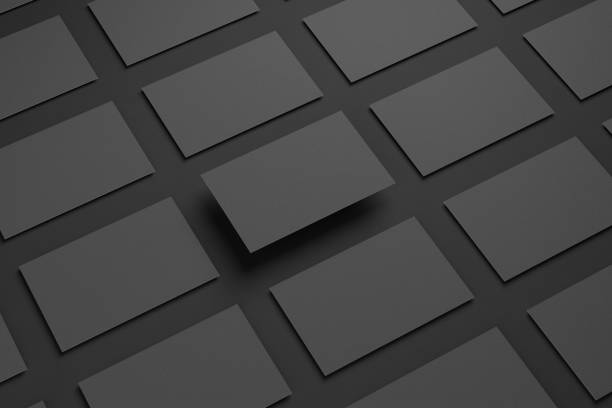 istock Black business card on a black background. 1358975946