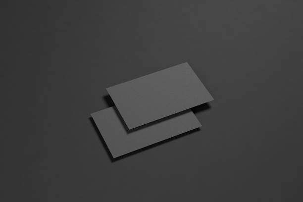 istock Black business card on a black background. 1358975955
