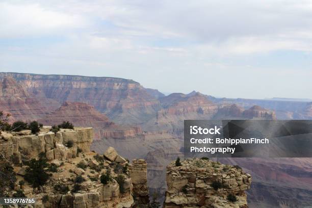 View Of The Grand Canyon Looking Across Under Cloudy Sky Stock Photo - Download Image Now