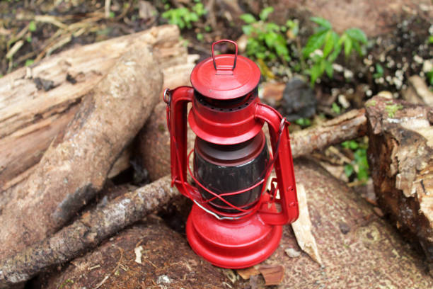 istock Red oil lantern on wood. 1358980281
