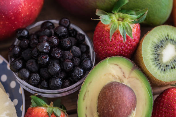 Raspberry, strawberry, kiwi and avocado, close up