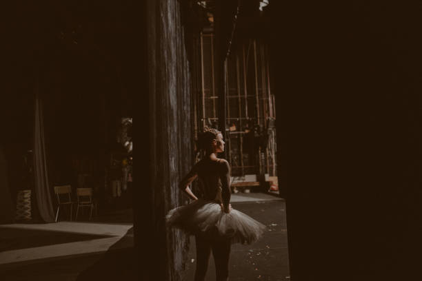 Backstage moments Photo of a ballerina backstage, waiting for the show to begin and anticipating her performance. rehearsal photos stock pictures, royalty-free photos & images