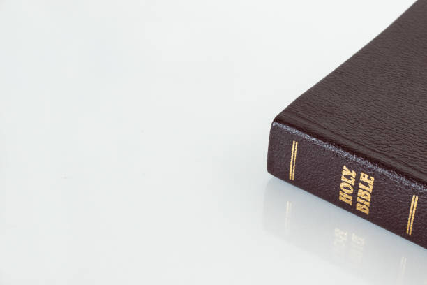 istock Closed Holy Bible Book on white background. Copy space for text 1358984688