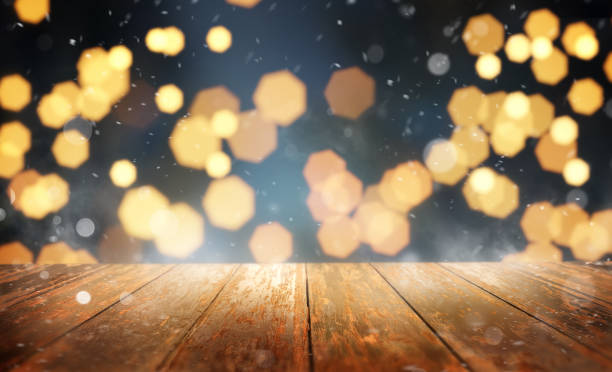 istock Christmas Holiday Wood Table And Lights Background 1358986326