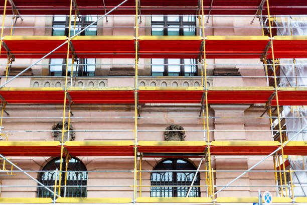 istock Facade restoration work. Scaffolding in front of the facade 1358987905