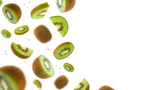 istock Kiwi fruit flying isolated on white background 1358988116
