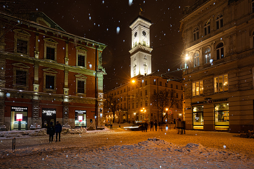 Lviv, Ukraine - February 17, 2021: Lviv city hall in winter at night