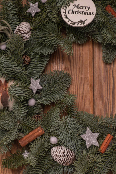 istock Closeup Christmas wreath made from live needles and natural materials.. Zero waste concept 1358993190