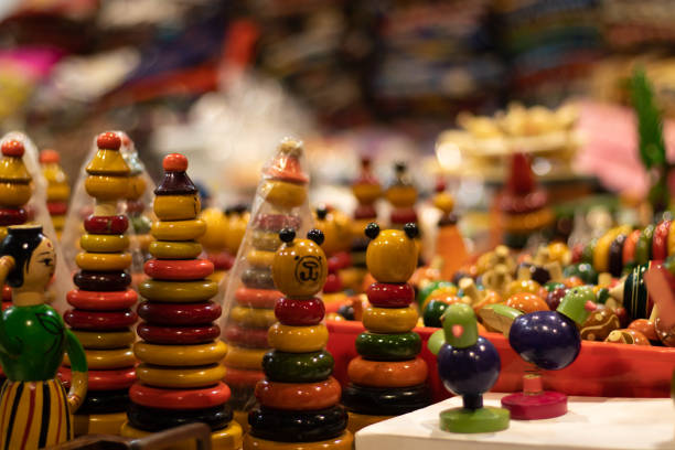 istock Multicolored Stacking Doll Figure With Various Rings Tapering To Top For New Born Babies Infants Or Kids. Eco Friendly Wooden Handmade Wooden Channapatna Ring Toys Originating From Karnataka, India 1358993306