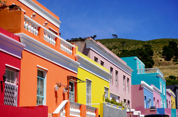Distinctive bright houses in the bo-kaap district of Cape Town, South Africa Bo-Kaap district, Cape Town, South Africa - 14 December 2021 : Distinctive bright houses in the bo-kaap district of Cape Town, South Africa, a traditionally Moslem area. malay quarter photos stock pictures, royalty-free photos & images