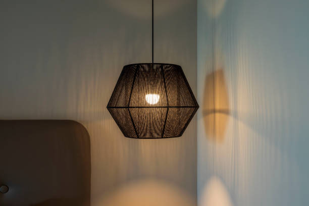 istock Close up view of beautiful modern black ceiling lamp. Greece. 1358993601