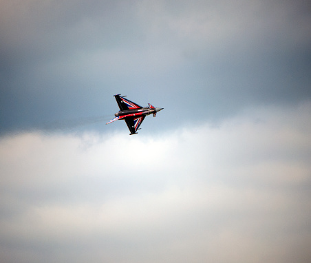 Weston-super-Mare, Somerset, England - June 21, 2015: The Red Arrows RAF Display team at the start of their show appearing at the Weston Air Festival