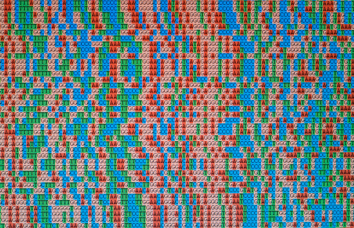 Unaligned DNA base sequences, photo taken from a computer screen