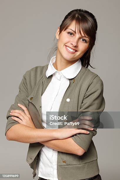 Young Female Standing With Folded Hands Stock Photo - Download Image Now - Adult, Adults Only, Beautiful People