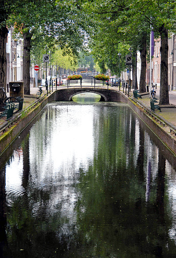 One of the famous canal views, Amsterdam, capital city, Netherlands, Amsterdam is renowned for its canal system, colourful narrow gabled facade terraced houses, liberal attitude towards the sex trade  and numerous bicycles, the principal form of transport in the city.
