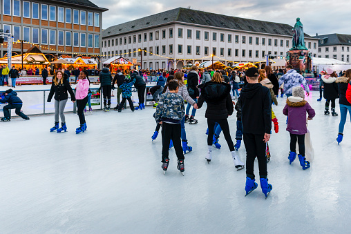 Karlsruhe, Germany - December 21, 2019: outdoor ice skating people in Karlsruhe, Germany.