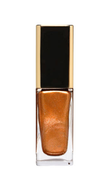istock Orange nail polish bottle on white background 1359000229