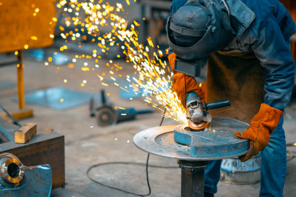 istock Metal Worker with the grinder 1359000244
