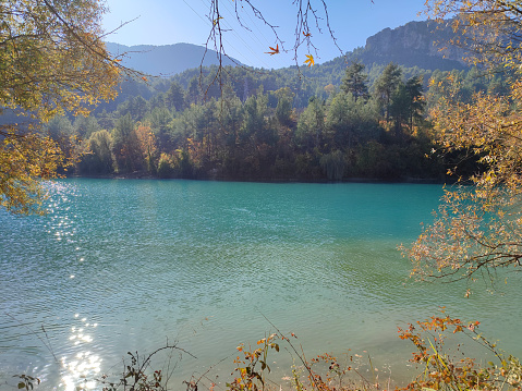 Lonely fisher boot at Beautiful view of lake