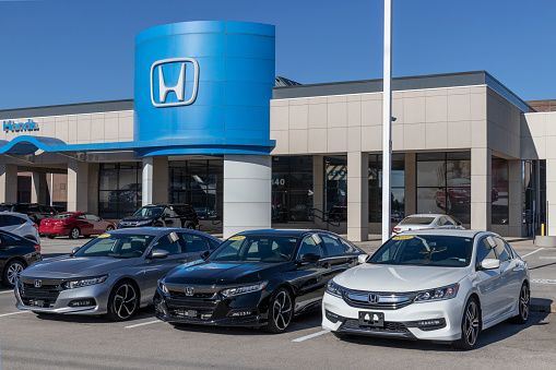 Indianapolis - Circa December 2021: Honda automobile and SUV dealership. With current supply issues, Honda is relying on used and pre-owned car sales while waiting for parts.