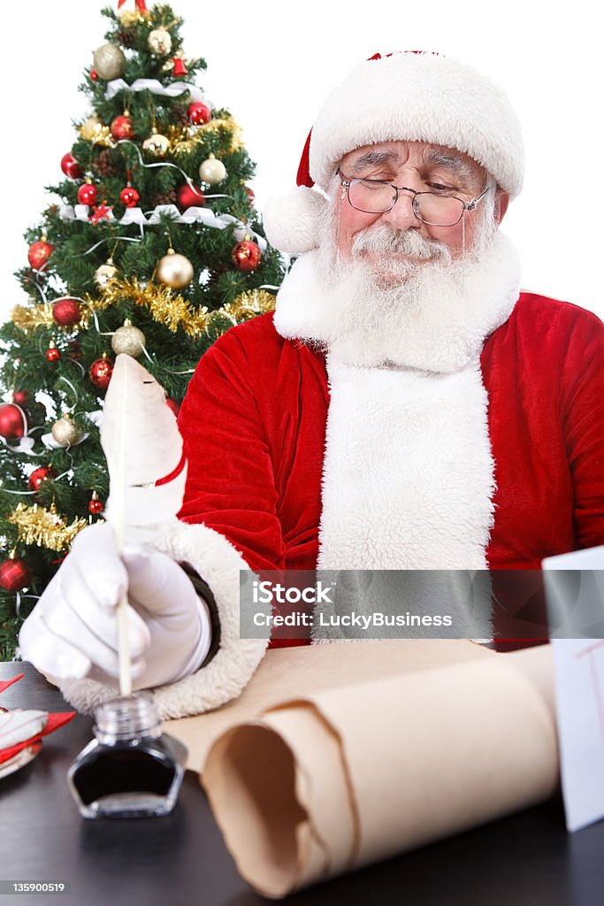 Santa écrit Liste de Noël - Photo de Adulte libre de droits