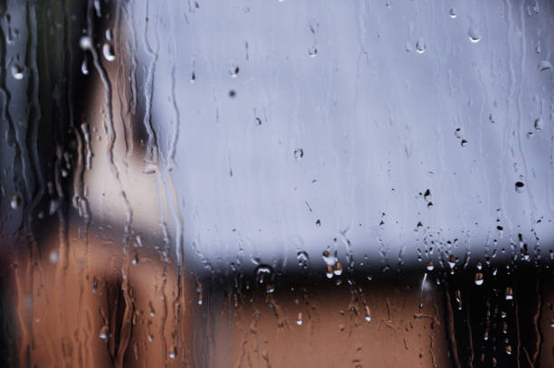 istock wet window on a rainy day, unfocused picture 1359008938