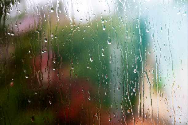 istock wet window on a rainy day, unfocused picture 1359009071