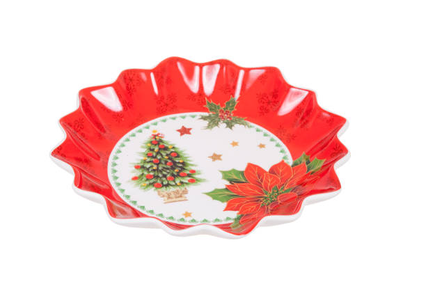 istock Salad plate with Christmas decoration, isolated on white 1359009072